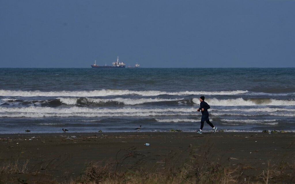 A man jogs along the southern coast of the Caspian Sea in the port city of Bandar Anzali, Iran, Decenmber 21, 2025. (AP Photo/Vahid Salemi) A man jogs along the southern coast of the Caspian Sea in the port city of Bandar Anzali, Iran, Decenmber 21, 2025. (AP Photo/Vahid Salemi)