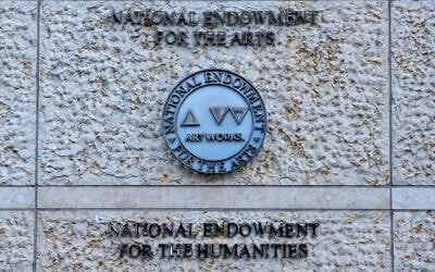 The official seal of the US National Endowment for the Arts and the National Endowment for the Humanities is seen on an office building in Washington, February 13, 2026. (AP Photo/Cliff Owen) The official seal of the US National Endowment for the Arts and the National Endowment for the Humanities is seen on an office building in Washington, February 13, 2026. (AP Photo/Cliff Owen)