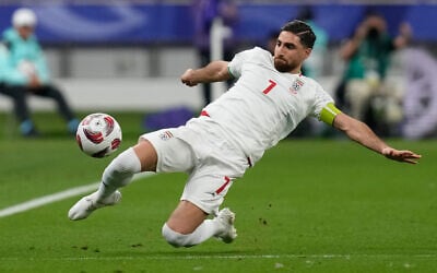 Iran's Alireza Jahanbakhsh passes the ball during the Asian Cup Group C soccer match between Hong Kong and Iran at Khalifa International Stadium in Doha, Qatar, Friday, Jan. 19, 2024. (AP Photo/Thanassis Stavrakis, File)