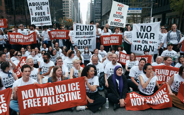 Chelsea Manning, bottom second left, Linda Sarsour, bottom second right, and protesters with Jewish Voice for Peace block traffic during a demonstration outside the New York office of US Senator Chuck Schumer, calling for an end to the US-Israel war with Iran, American support for Israel, and the Immigrations and Customs Enforcement agency on April 13, 2026, in New York. (AP Photo/Andres Kudacki) Chelsea Manning, bottom second left, Linda Sarsour, bottom second right, and protesters with Jewish Voice for Peace block traffic during a demonstration outside the New York office of US Senator Chuck Schumer, calling for an end to the US-Israel war with Iran, American support for Israel, and the Immigrations and Customs Enforcement agency on April 13, 2026, in New York. (AP Photo/Andres Kudacki)
