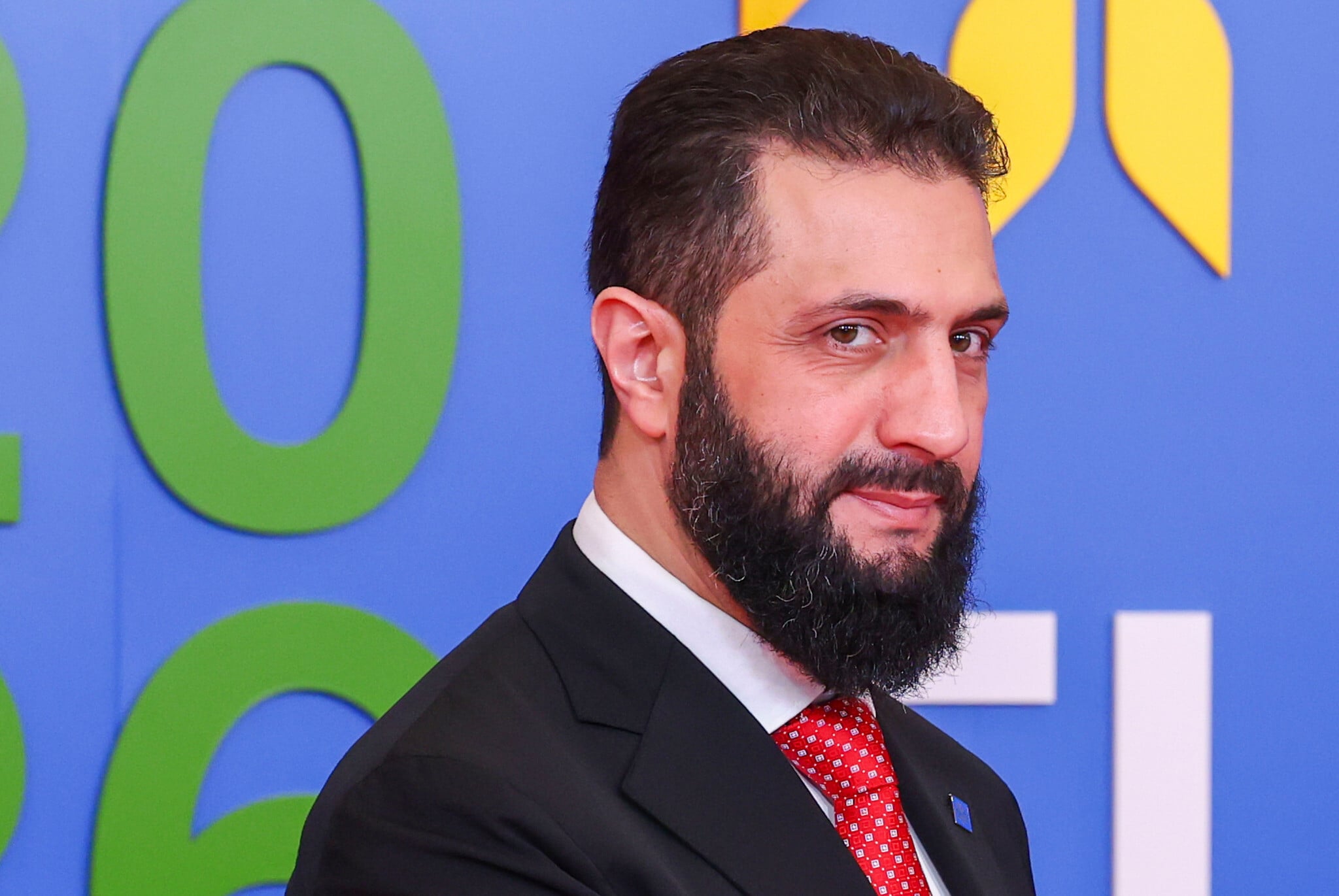 Syria president shuffles government officials and ministers, boots brother from key post