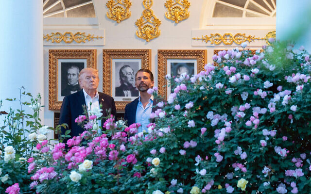 US President Donald Trump and Donald Trump Jr. watch from the Rose Garden as Marine One departs after their arrival at the White House, May 3, 2026, in Washington. (AP Photo/Jose Luis Magana) US President Donald Trump and Donald Trump Jr. watch from the Rose Garden as Marine One departs after their arrival at the White House, May 3, 2026, in Washington. (AP Photo/Jose Luis Magana)