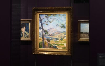 French painter Pierre-Auguste Renoir's painting, "Madame Alphonse Daudet," left, is seen at the Musée d'Orsay museum's new permanent gallery dedicated artworks recovered after World War II whose ownership remains uncertain, in Paris on May 4, 2026. (AP Photo/Thibault Camus)