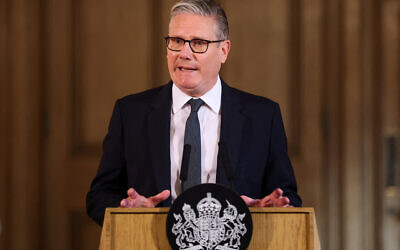 Britain's Prime Minister Keir Starmer speaks, during a meeting with leaders from across society to discuss tackling antisemitism, at Downing Street in London, Tuesday, May 5, 2026. (Hannah McKay/Pool Photo via AP)