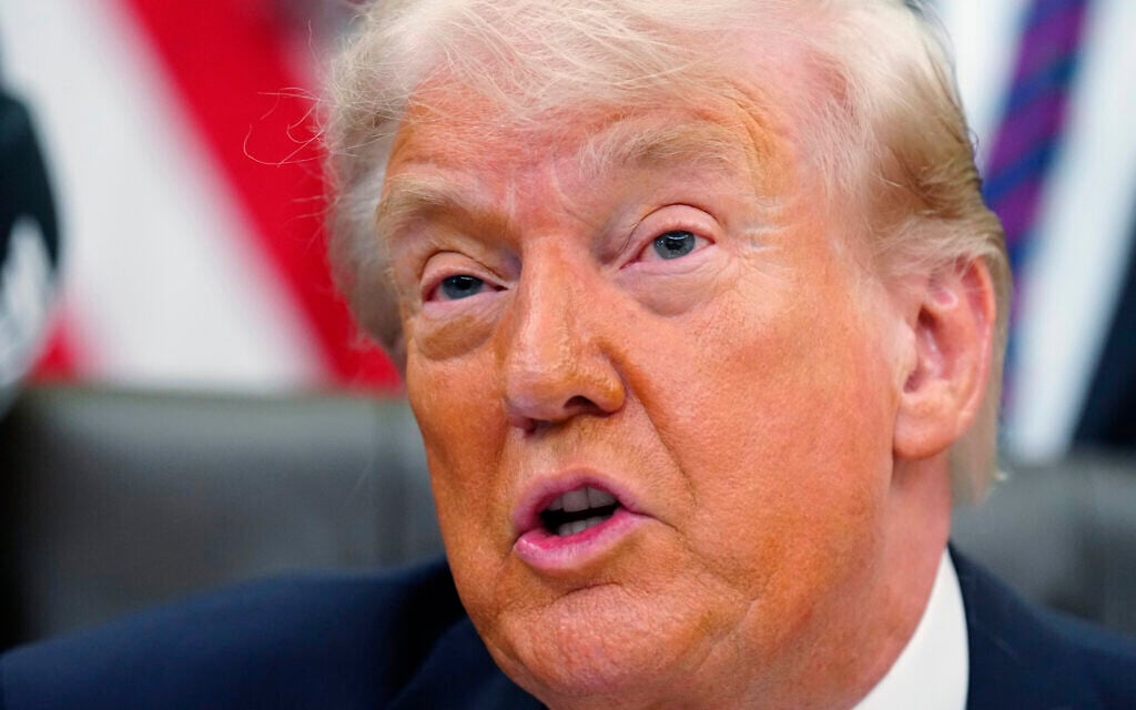 Claiming ‘great progress’ in Iran talks, Trump says US pausing naval escorts in Hormuz
