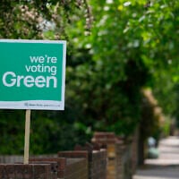 A Green Party political sign put up by the householder to show support ahead of local council elections in London, May 6, 2026. (AP Photo/Alastair Grant)