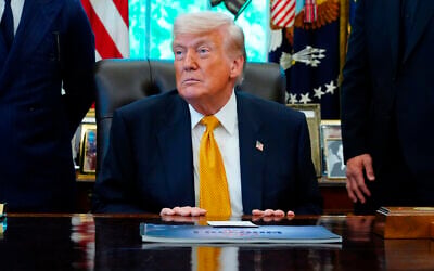US President Donald Trump meets with UFC fighters, May 6, 2026, in the Oval Office of the White House, in Washington. (AP Photo/Jacquelyn Martin)