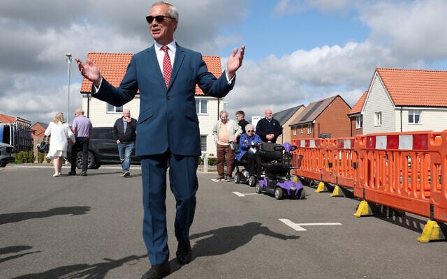 Britain's Reform Party leader Nigel Farage arrives at a polling station in Walton on the Naze, England, on May 7, 2026 to cast his vote in the local elections.(AP/Richard Pelham) Britain's Reform Party leader Nigel Farage arrives at a polling station in Walton on the Naze, England, on May 7, 2026 to cast his vote in the local elections.(AP/Richard Pelham)