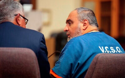 Attorney Ron Bamieh, left, listens to his client Loay Abdelfattah Alnaji in Ventura County Superior Court on November 17, 2023, in Ventura, California. (AP/Damian Dovarganes) Attorney Ron Bamieh, left, listens to his client Loay Abdelfattah Alnaji in Ventura County Superior Court on November 17, 2023, in Ventura, California. (AP/Damian Dovarganes)