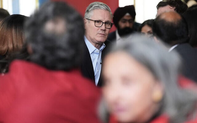 Britain's Prime Minister Sir Keir Starmer meets Labour Party members at Kingsdown Methodist Church Hall, in Ealing, west London, May 8, 2026, a day after the local elections. (Stefan Rousseau/PA via AP)