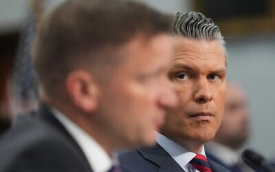 US Defense Secretary Pete Hegseth, right, watches as acting Under Secretary of Defense and Comptroller Jules Hurst III testifies at a House Appropriations subcommittee budget hearing for the US Department of Defense, on Capitol Hill in Washington, May 12, 2026. (AP Photo/Alex Brandon) US Defense Secretary Pete Hegseth, right, watches as acting Under Secretary of Defense and Comptroller Jules Hurst III testifies at a House Appropriations subcommittee budget hearing for the US Department of Defense, on Capitol Hill in Washington, May 12, 2026. (AP Photo/Alex Brandon)