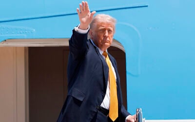 US President Donald Trump waves from the stairs of Air Force One as he boards upon his arrival at Joint Base Andrews, Maryland, May 12, 2026, for a trip to China to meet President Xi Jinping. (AP Photo/Luis M. Alvarez) US President Donald Trump waves from the stairs of Air Force One as he boards upon his arrival at Joint Base Andrews, Maryland, May 12, 2026, for a trip to China to meet President Xi Jinping. (AP Photo/Luis M. Alvarez)