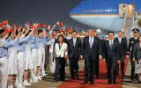 US President Donald Trump walks with China's Vice President Han Zheng during a welcome ceremony at Beijing Capital International Airport in Beijing, May 13, 2026. (Mark Schiefelbein/AP)
