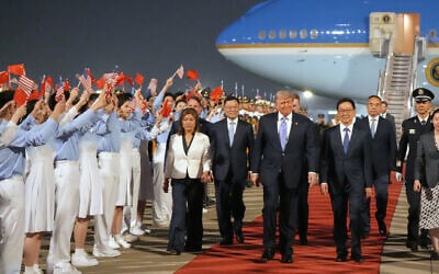 US President Donald Trump walks with China's Vice President Han Zheng during a welcome ceremony at Beijing Capital International Airport in Beijing, May 13, 2026. (Mark Schiefelbein/AP) US President Donald Trump walks with China's Vice President Han Zheng during a welcome ceremony at Beijing Capital International Airport in Beijing, May 13, 2026. (Mark Schiefelbein/AP)