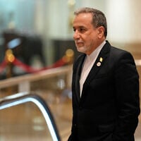 Iranian Foreign Minister Abbas Araghchi arrives for a meeting during the two-day BRICS summit in New Delhi, India, on May 14, 2026. (AP Photo/Manish Swarup)