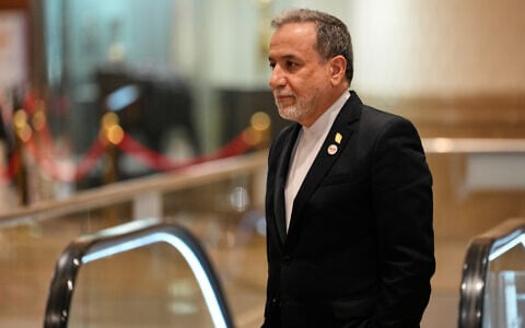 Iranian Foreign Minister Abbas Araghchi arrives for a meeting during the two-day BRICS summit in New Delhi, India, on May 14, 2026. (AP Photo/Manish Swarup)
