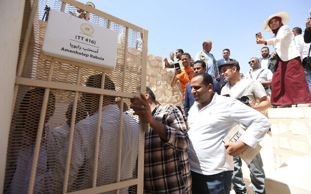 Visitors line up to enter the tomb of Rabuya, door keeper of Amun during the 18th Dynasty, after restorations help by the Zahi Hawass Foundation for Heritage and Antiquities in Luxor, Egypt, May 14, 2026. (AP Photo)