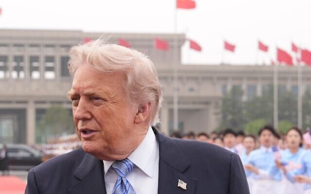 US President Donald Trump walks to board Air Force One, on May 15, 2026, at Beijing Capital International Airport in Beijing. (AP Photo/Mark Schiefelbein) US President Donald Trump walks to board Air Force One, on May 15, 2026, at Beijing Capital International Airport in Beijing. (AP Photo/Mark Schiefelbein)