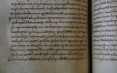A rare, long-lost copy of Caedmon's Hymn — the oldest surviving poem in Old English — is visible in the five lines above the final line of a page from an 8th-century manuscript copy of the Venerable Bede's Ecclesiastical History of the English People, at Rome's National Library, May 8, 2026. (AP Photo/Andrea Rosa) A rare, long-lost copy of Caedmon's Hymn — the oldest surviving poem in Old English — is visible in the five lines above the final line of a page from an 8th-century manuscript copy of the Venerable Bede's Ecclesiastical History of the English People, at Rome's National Library, May 8, 2026. (AP Photo/Andrea Rosa)