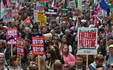 Protesters march during a pro-Palestine demonstration in London, May 16, 2026. (AP Photo/Thomas Krych)