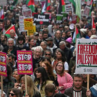 Protesters march during a pro-Palestine demonstration in London, May 16, 2026. (AP Photo/Thomas Krych)