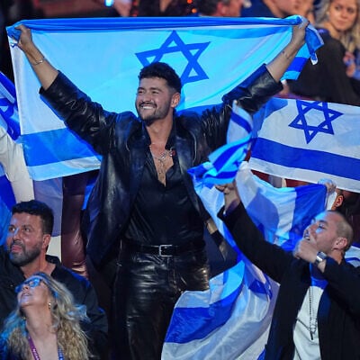 Noam Bettan from Israel, center, reacts as the points are awarded during the Grand Final of the 70th Eurovision Song Contest in Vienna, Austria, May 17, 2026. (AP/Martin Meissner)