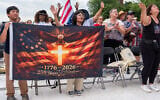 People worship to Christian music at Rededicate 250, a mostly conservative Christian prayer gathering in honor of the United States' 250th anniversary, on the National Mall in Washington, DC, Sunday, May 17, 2026. (AP/Julia Demaree Nikhinson)