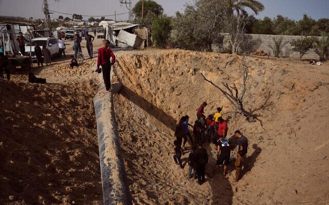 Palestinians inspect the destruction caused by an Israeli strike in Khan Younis, southern Gaza Strip, May 19, 2026. (AP Photo/Abdel Kareem Hana) Palestinians inspect the destruction caused by an Israeli strike in Khan Younis, southern Gaza Strip, May 19, 2026. (AP Photo/Abdel Kareem Hana)