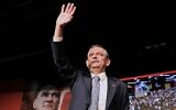CHP leader Ozgur Ozel gestures to party members during his speech during a party convention, in Ankara, Turkey, April 6, 2025. (AP Photo/Ali Unal)