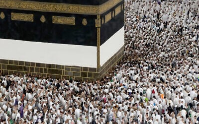 Muslim pilgrims circumambulate the Kaaba, Islam's holiest site at the Grand Mosque, during the annual Hajj pilgrimage in Mecca, Saudi Arabia, Friday, May 22, 2026. (AP Photo/Altaf Qadri)