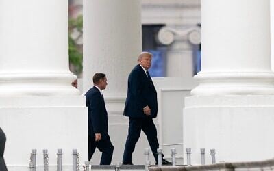 US President Donald Trump arrives at the White House , May 22, 2026, in Washington. (AP Photo/Jose Luis Magana)
