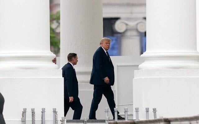 US President Donald Trump arrives at the White House , May 22, 2026, in Washington. (AP Photo/Jose Luis Magana)