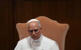 Pope Leo XIV attends the presentation of his first encyclical, 'Magnifica Humanitas: On Safeguarding the Human Person in the Time of Artificial Intelligence,' at the Vatican, May 25, 2026. (AP Photo/Alessandra Tarantino)
