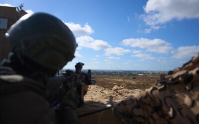 An IDF soldier occupies a military position overlooking the Yellow Line in the central Gaza Strip, May 26, 2026. (AP Photo/Ariel Schalit)