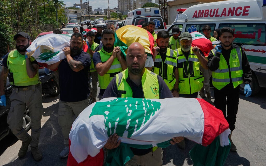Mourners and paramedics carry the bodies of family members killed on Wednesday when their car was struck in an Israeli airstrike on a highway, during a funeral procession in the southern port city of Tyre, Lebanon, May 29, 2026. (AP Photo/Mohammed Zaatari) Mourners and paramedics carry the bodies of family members killed on Wednesday when their car was struck in an Israeli airstrike on a highway, during a funeral procession in the southern port city of Tyre, Lebanon, May 29, 2026. (AP Photo/Mohammed Zaatari)