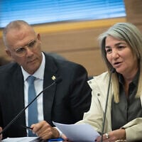 Then-PMO director Yossi Shelley (L) with Drorit Steinmetz in the Knesset, in Jerusalem, on February 22, 2023. (Yonatan Sindel/Flash90)