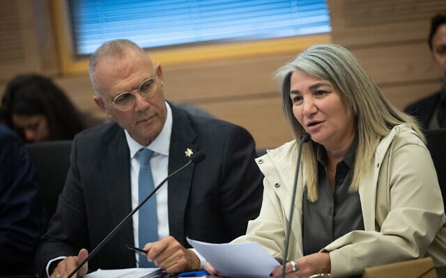 Then-PMO director Yossi Shelley (L) with Drorit Steinmetz in the Knesset, in Jerusalem, on February 22, 2023. (Yonatan Sindel/Flash90)