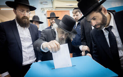 Rabbi Dov Lando casts his vote at a voting station on the morning of the Municipal Elections, in Bnei Brak, on February 27, 2024. (Chaim Goldberg/ Flash90/ File)