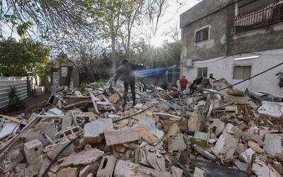 People inspect a house that was destroyed by Israeli authorities in the East Jerusalem neighborhood of Silwan, December 30, 2025. (Jamal Awad/Flash90) People inspect a house that was destroyed by Israeli authorities in the East Jerusalem neighborhood of Silwan, December 30, 2025. (Jamal Awad/Flash90)