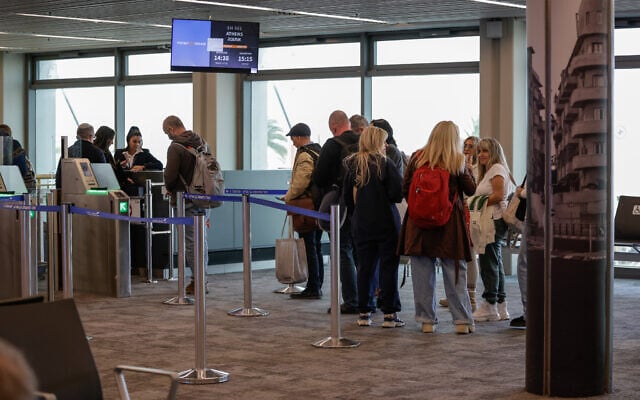Passengers wait for their flight at Terminal 1 at Ben Gurion International Airport, February 17, 2026 (Rachel Alroey/Flash90)