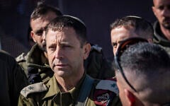 IDF Central Command chief Maj. Gen. Avi Bluth watches as Palestinians pass through the Qalandia checkpoint on their way to attend Ramadan prayers at Jerusalem’s Al-Aqsa Mosque, February 20, 2026. (Chaim Goldberg/Flash90)
