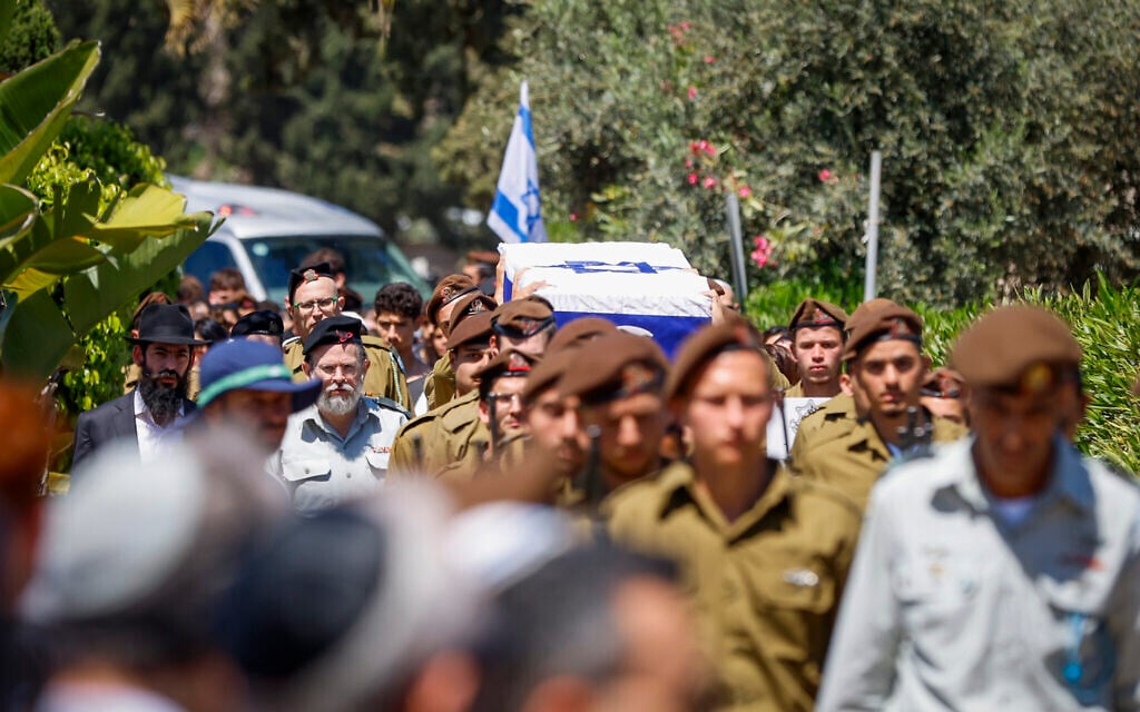 Family and friends of IDF soldier Sgt. Liem Ben Hamo attend his funeral at the military cemetery in Herzliya on May 1, 2026. He was killed during the ground offensive in southern Lebanon. (Tal Gal/Flash90)