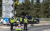 Police officers guard a checkpoint near Meron, northern Israel, after the Lag B'Omer celebrations were canceled and the area was declared a closed military zone, May 3, 2026. (David Cohen/Flash90)