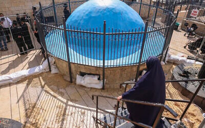 Jewish worshipers seen at the gravesite of Rabbi Shimon Bar Yochai in Meron, northern Israel, after Lag B'Omer celebrations were canceled, May 3, 2026. (David Cohen/Flash90)