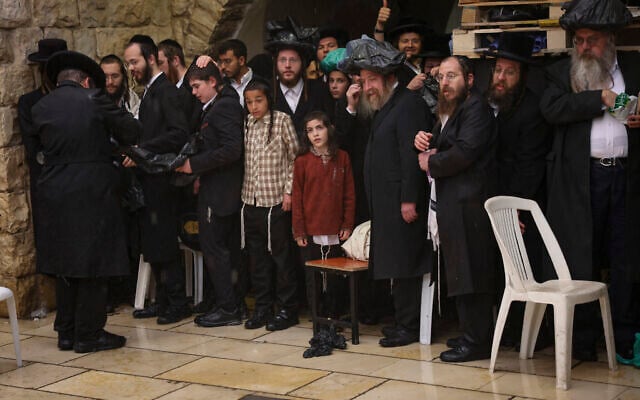 Jewish worshipers seen at the gravesite of Rabbi Shimon Bar Yochai in Meron, northern Israel, after Lag B'Omer celebrations were scaled back, May 4, 2026 (David Cohen/Flash90) Jewish worshipers seen at the gravesite of Rabbi Shimon Bar Yochai in Meron, northern Israel, after Lag B'Omer celebrations were scaled back, May 4, 2026 (David Cohen/Flash90)