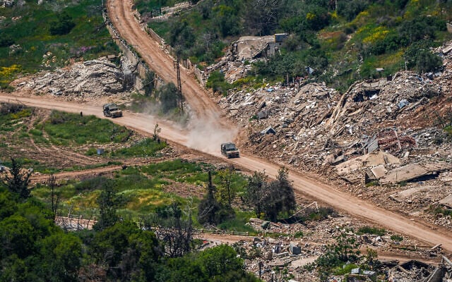 IDF soldiers operate inside southern Lebanon, as seen from the Israeli side of the border, May 11, 2026 (Ayal Margolin/Flash90)