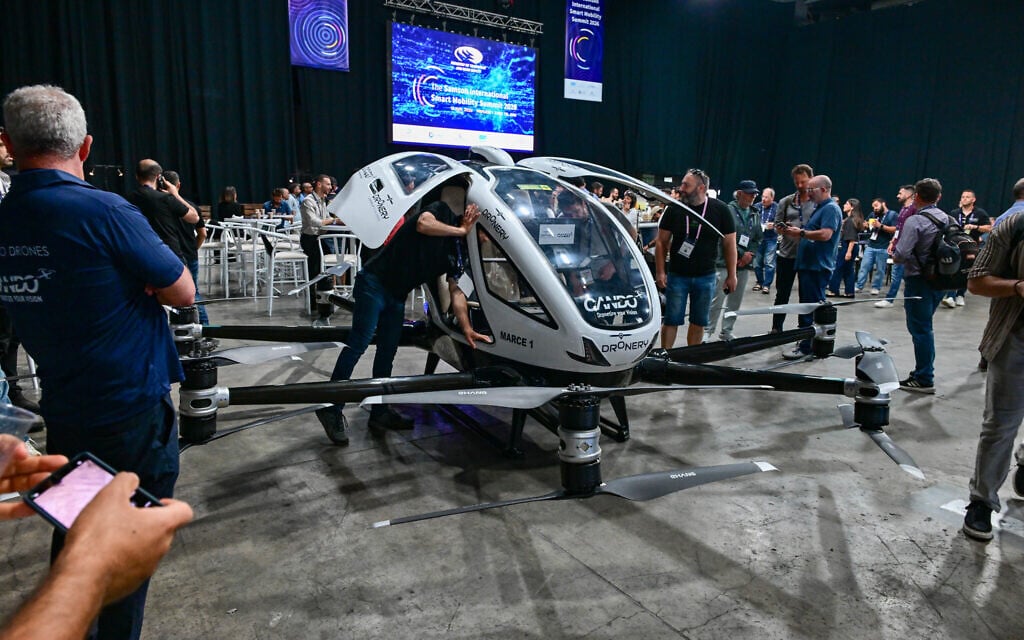 People visit the 9th Annual Samson International Smart Mobility Summit in Tel Aviv, May 18, 2026. (Avshalom Sassoni/Flash90)