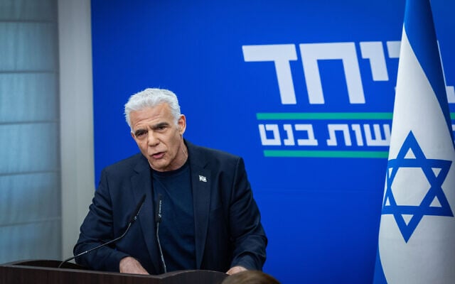 Opposition Leader Yair Lapid leads a Yesh Atid faction meeting at the Knesset in Jerusalem, on May 18, 2026. (Chaim Goldberg/Flash90)