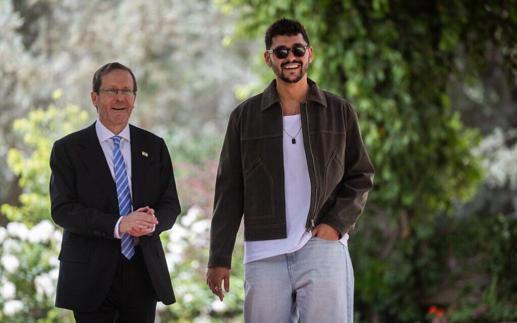 Israeli singer Noam Bettan, who represented Israel at the Eurovision Song Contest in Vienna (right), meets with President Isaac Herzog at the President’s Residence in Jerusalem, May 18, 2026. (Yonatan Sindel/Flash90)