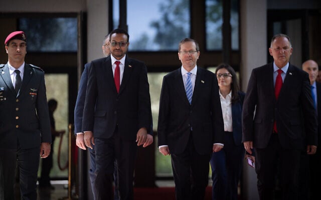 President Isaac Herzog (center right) with Somaliland’s first ambassador to Israel, Dr. Mohamed Hagi (center left), during a ceremony at the President’s Residence in Jerusalem, May 18, 2026. (Yonatan Sindel/Flash90)
